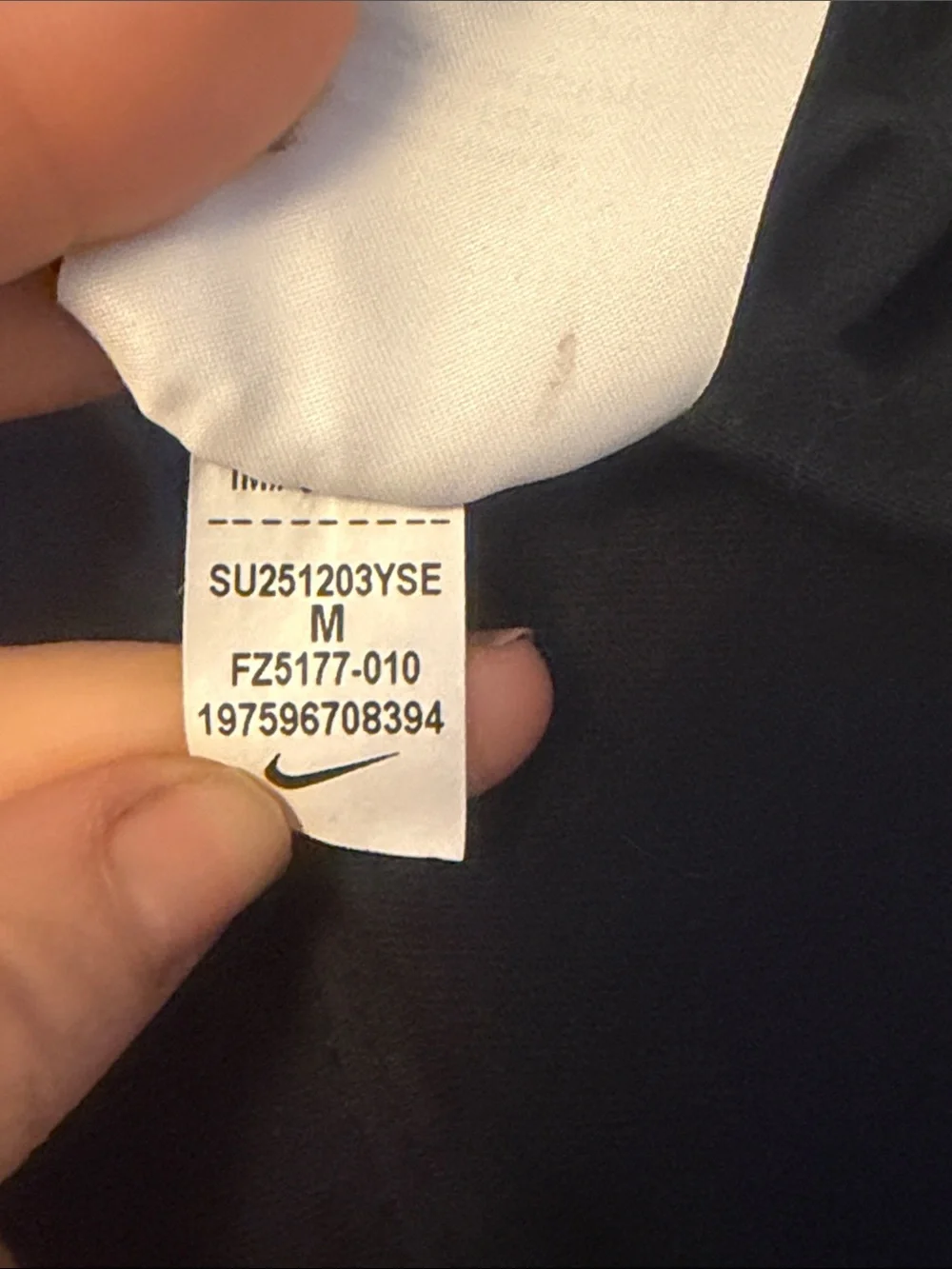 Nike Black T-Shirt with White Swoosh Logo